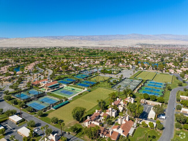 Sunny skies, lush greens, and your dream home in Mission Hills!