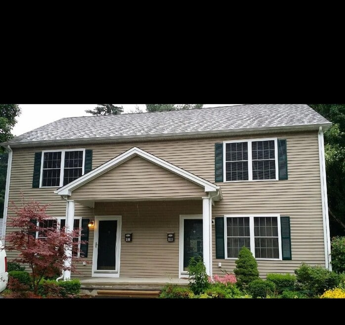 Beautiful two bedroom apartment with hardwood floors. Nice large backyard with a shed for kayaks