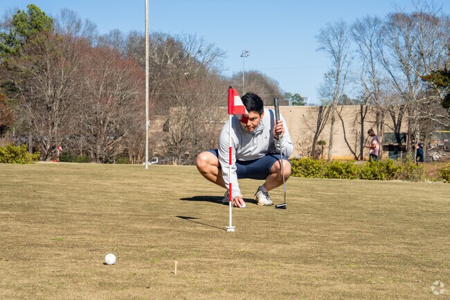 Residents can practice their putts before heading on the course at Chastain Park.