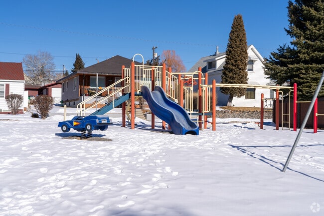 Tot Park in West Side Butte offers fun play structures for kids.