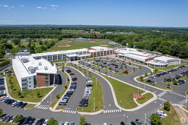 After recently absorbing Enrico Fermi High School, Enfield High School is yjr high school that all students in Thompsonville attend.