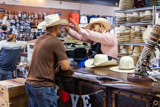 Have your hat shaped by Raymond, the best in town, near Bellaire Heights.