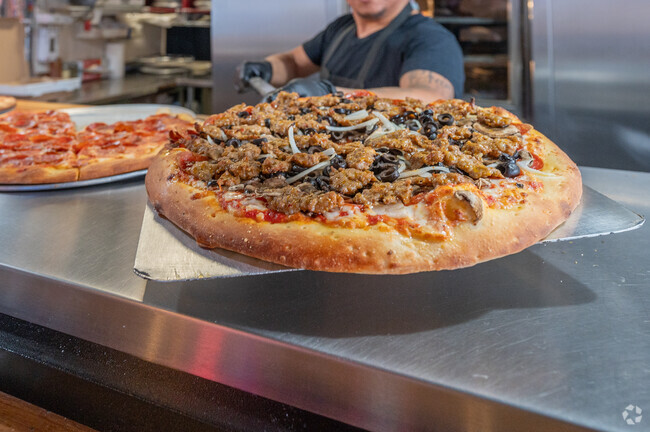 Grab a slice at Flying Pies Pizzeria next to Squak Mountain.