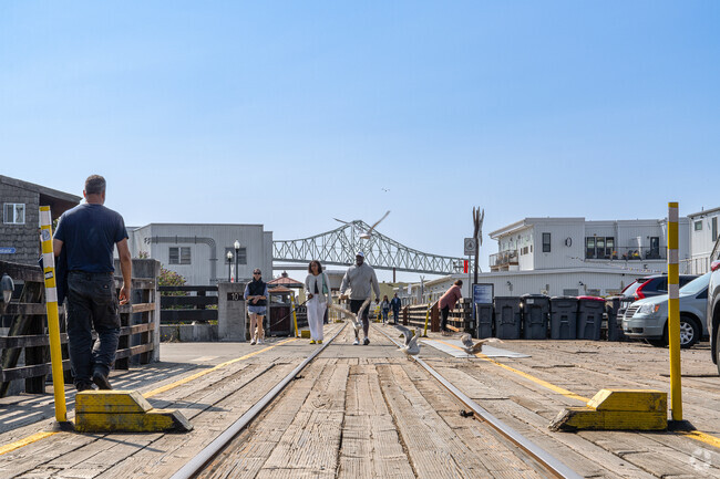 Astoria residents enjoy recreational activities along the Astoria Riverwalk.