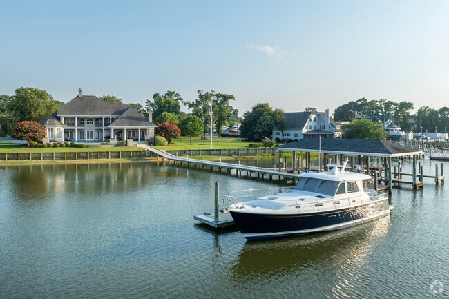 Waterfront estates and private boat docks line the attractive shores of Newtown.