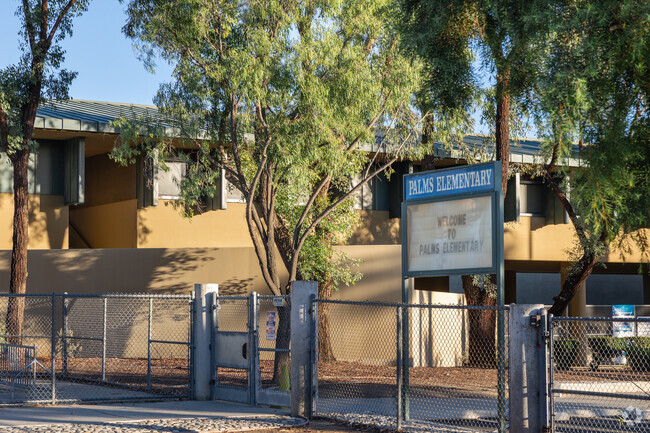 A sign welcomes students as they enter the Palms Elementary School campus in Perris.