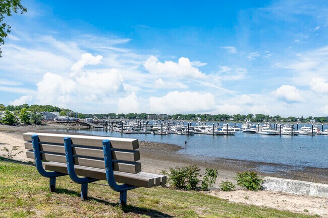 Bench overlooking the water at Avalon Beach in Quincy Point.