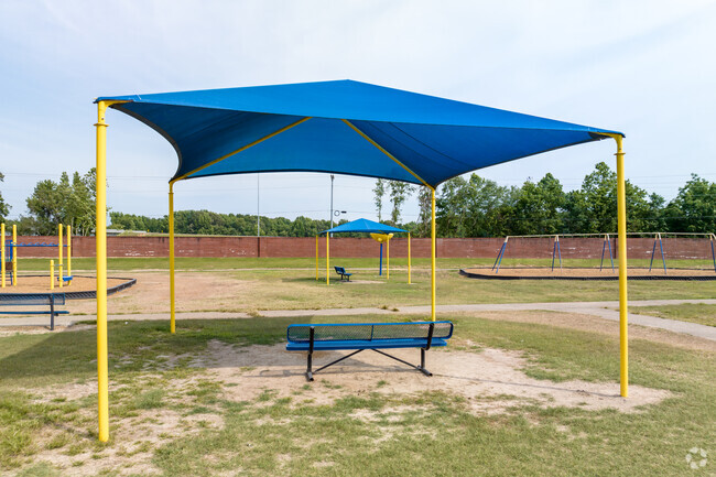 Olive Branch Intermediate School has shaded seating at the playground.