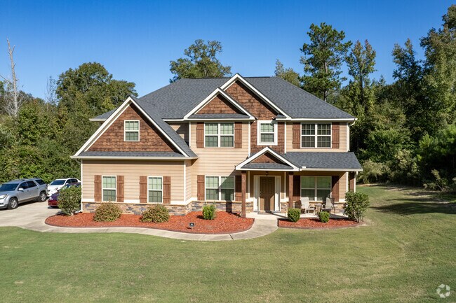 You will love modern craftsman style home in the Cataula area.