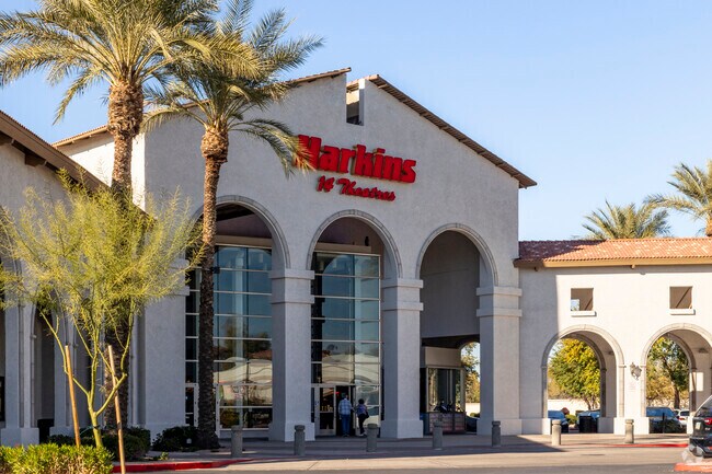 See a movie at locally owned Harkins Theater at the Village at Shea near Shea Corridor.