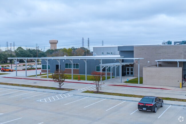 The school offers a covered area for bus riding students.