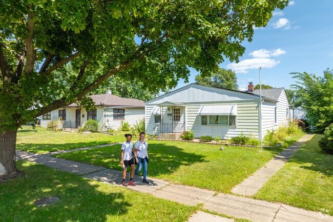 Go for an afternoon walk along the paved sidewalks of North End Square.