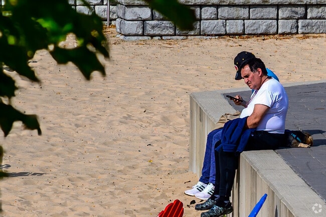 Rotary Park includes a sandy beach, which is popular during the summer, in The Stadium District.
