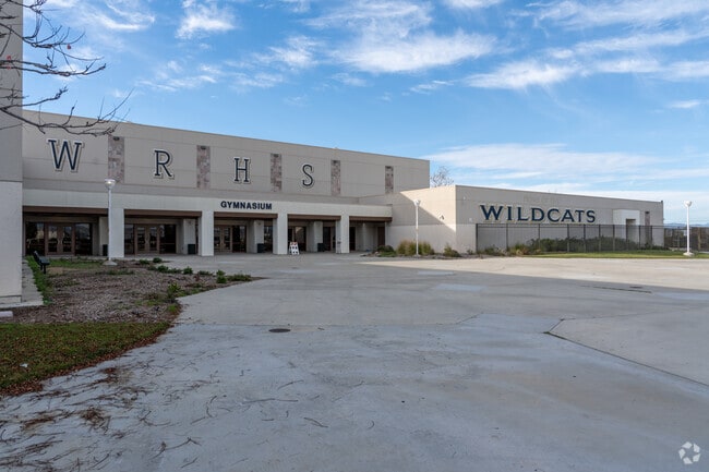 The total minority enrollment at West Ranch High School is 59%.