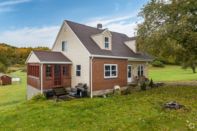 This Cape Cod home is nestled among rolling hills in rural Allegheny Township.