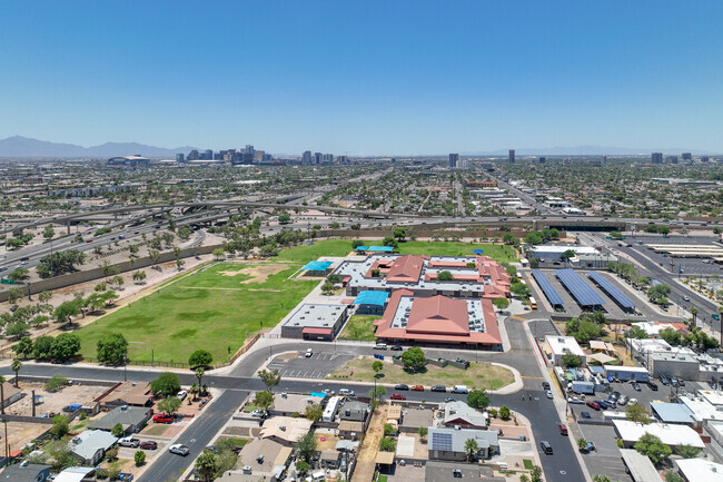 Excelencia School is located near the intersection of State Route 51 and Loop 202.