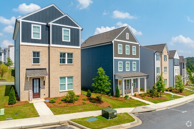 Monroe Heights features new residential developments with walkable paths and manicured lawns.