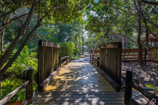 A footbridge spans the Arboretum in Constitution Park.