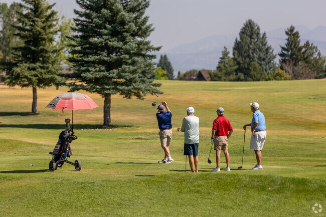 A man watches the ball soar at Bill Roberts Golf Course, a North Central golfing gem.