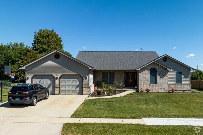 Modern ranch-style homes with attached garages are common in DeKalb.