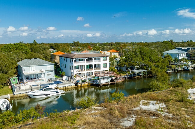 Multi-level homes with private boating docks can be found in Bayside West FL.