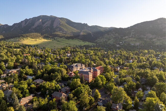 University Hill streets are surrounded by hills and trees.