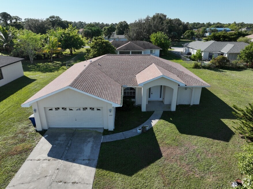 1633 Covington Meadows Cir, Lehigh Acres, FL 33936 - photo 2