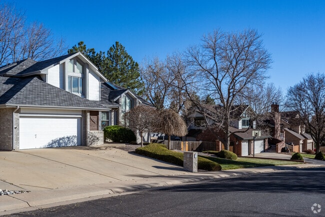 A craftsman home with brick detailing in Oak Crest South, Arvada, Colorado.