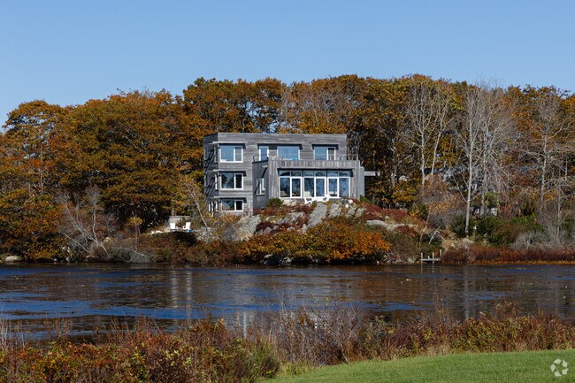 This contemporary home sits on the banks of Etherington Pond in Fortunes Rocks.