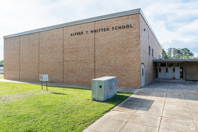 The school's facilities include classrooms equipped with technology for interactive learning.