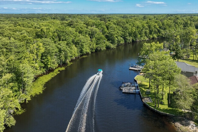 Power boating is enjoyed along the Waccamaw River in Red Hill.