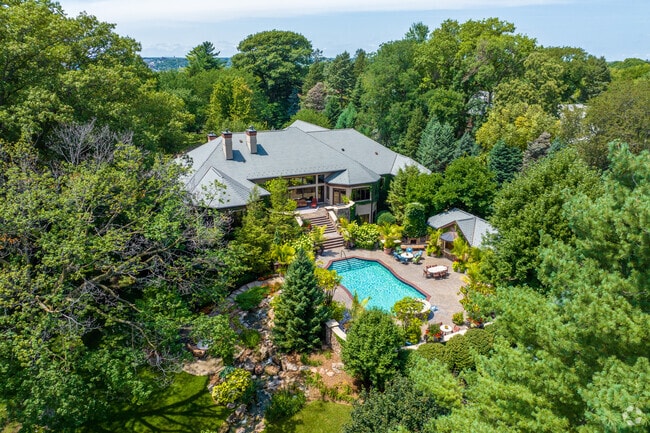 Fairacres features luxurious homes set among dense trees featuring breathtaking amenities.