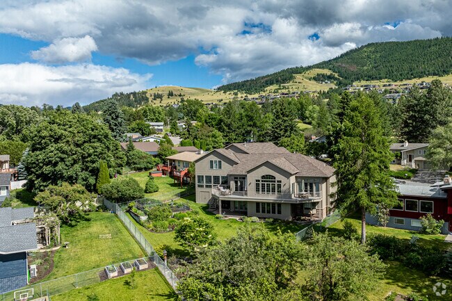 Each log cabin in Pattee Canyon tells a story of resilience and endurance, standing strong again