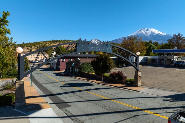 A welcome sign greets visitors entering Weed, California.