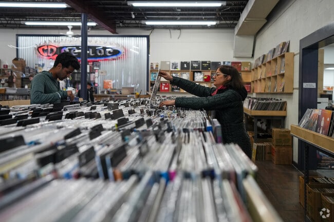 A Falls Church resident checks out one of the many options at CD Cellar.