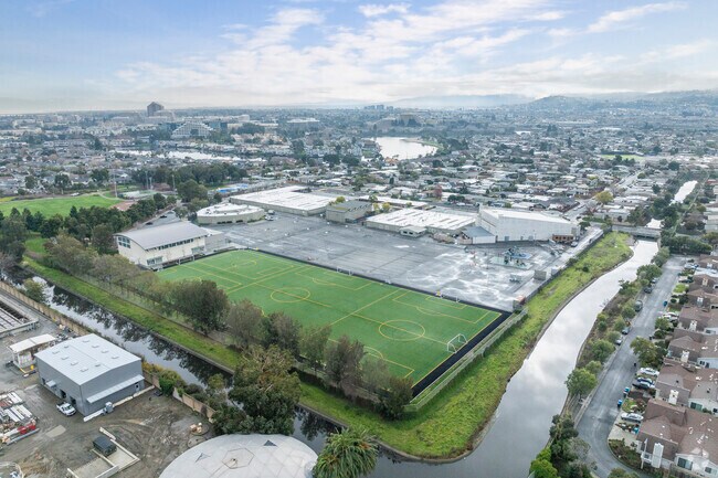 Bayside Academy is connected to Joinville Park.