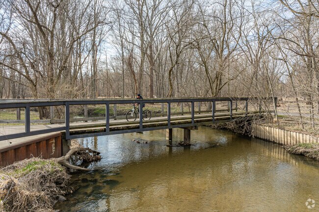 Walk or ride your bike across the bridge over Buck Creek at Palmer Park in Wyoming, Michigan.