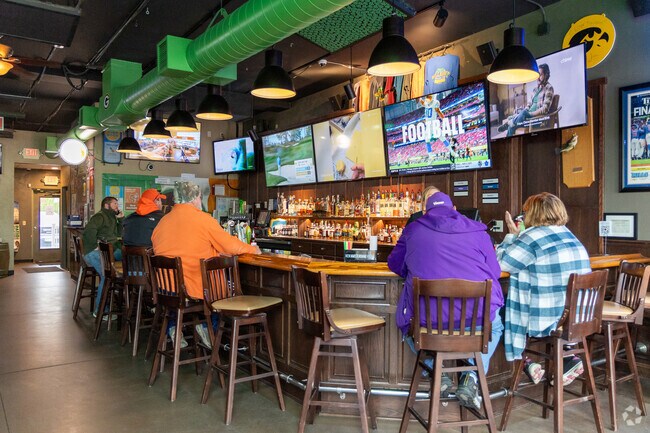Visitors enjoy the Irish bar at Mulligan's Valley Pub in Coal Valley.