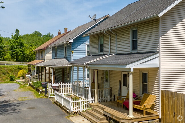 Twin homes of Glendon often provide covered front porches for added relaxation.
