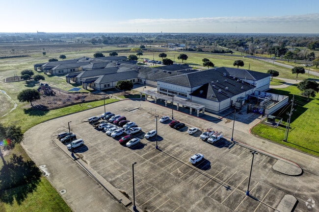 Nestled near the iconic Sealy Water Tower, the campus exudes small-town warmth.