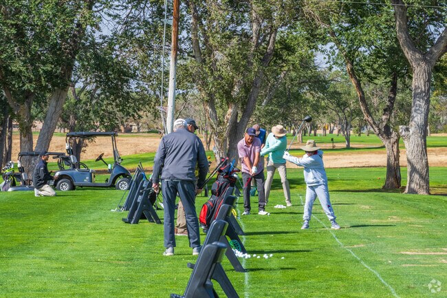 Las Soleras residents can practice on the driving range at the nearby golf course.