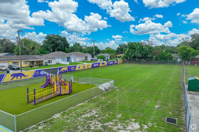 Lomax Magnet Elementary School features open-play areas around its property.