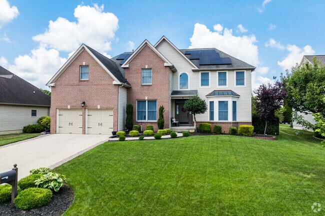 Some Mansfield Township homes have solar panels to generate their own electricity.