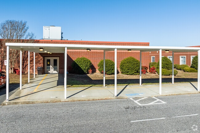 Ward Elementary School offers a covered walkway for convenient drop-offs and pick-ups.