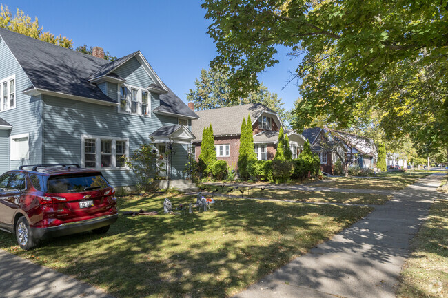 Tree lined streets of Southeast Side have sidewalks for pedestrian safety.