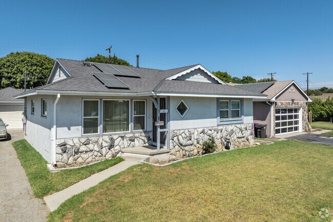 The stucco and stone compliments this Longwood residence.