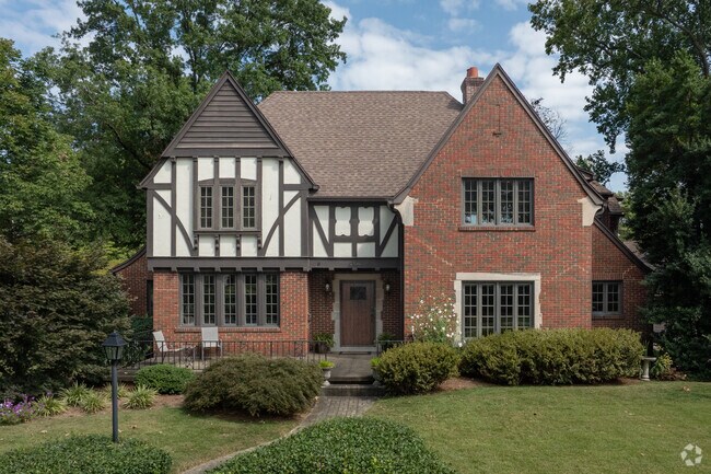 This is a Tudor Revival style home in the Greater Lincolnshire neighborhood.