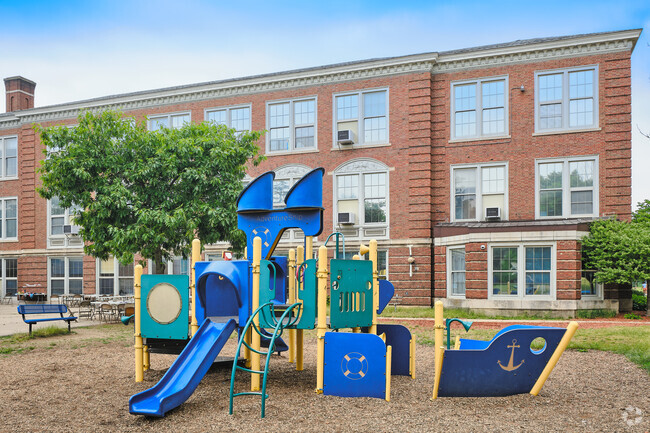 A pirate ship playset behind Burns Park Elementary challenges students to brave imaginary seas.