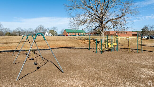 Students at Norwood Elementary School have a blast on this playground at recess.