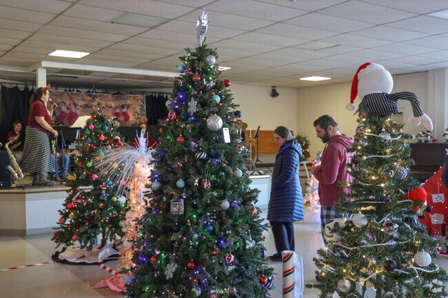 Neighbors look forward to the Fishtown Horribles Parade of Trees.